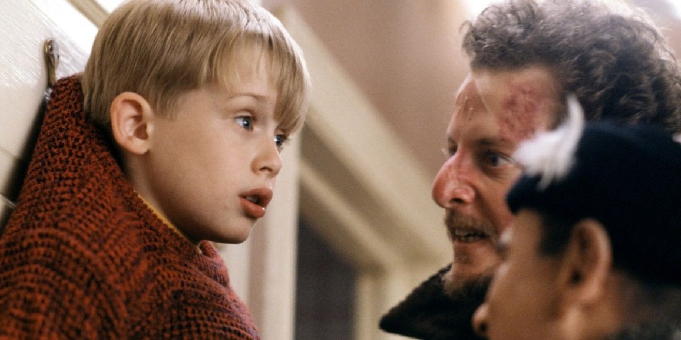 The Wet Bandits pin Kevin up against the wall in Home Alone