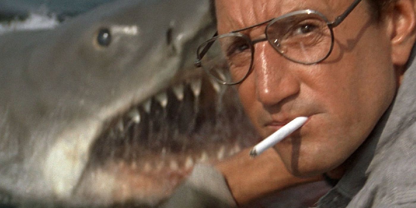 Chief Brody slings chum while the shark attacks in Jaws