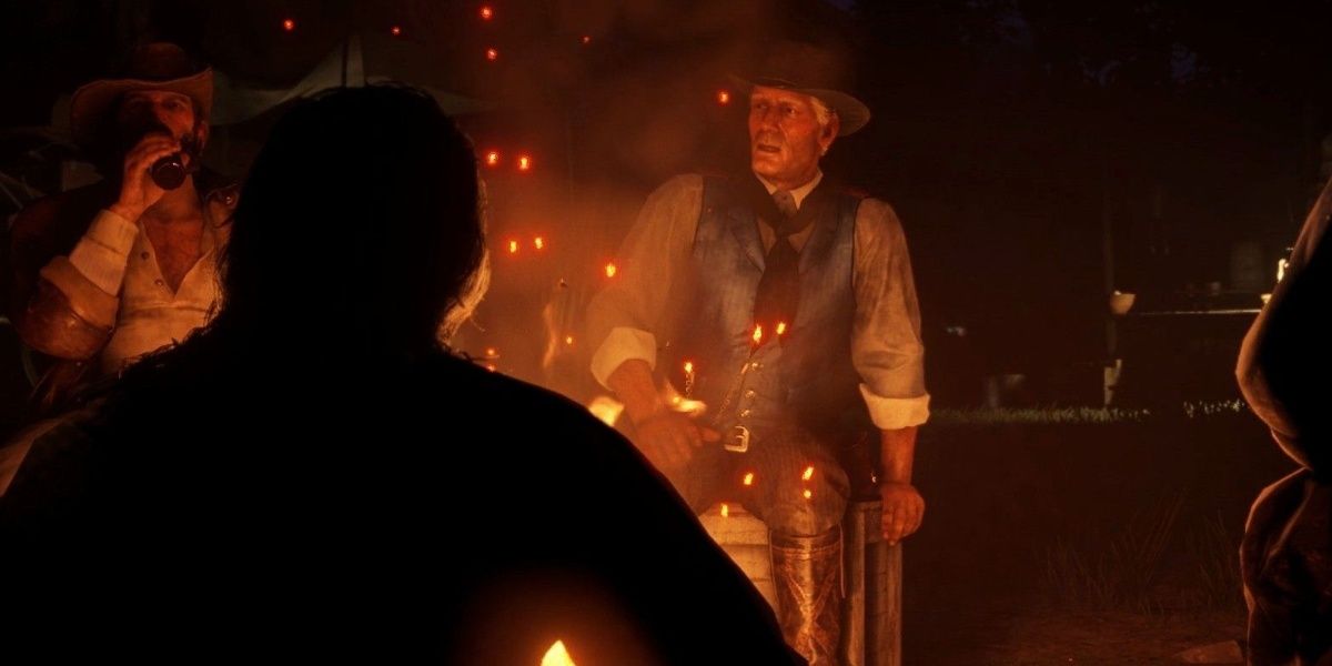 Red Dead Redemption 2 Hosea Matthews sitting by the camp fire