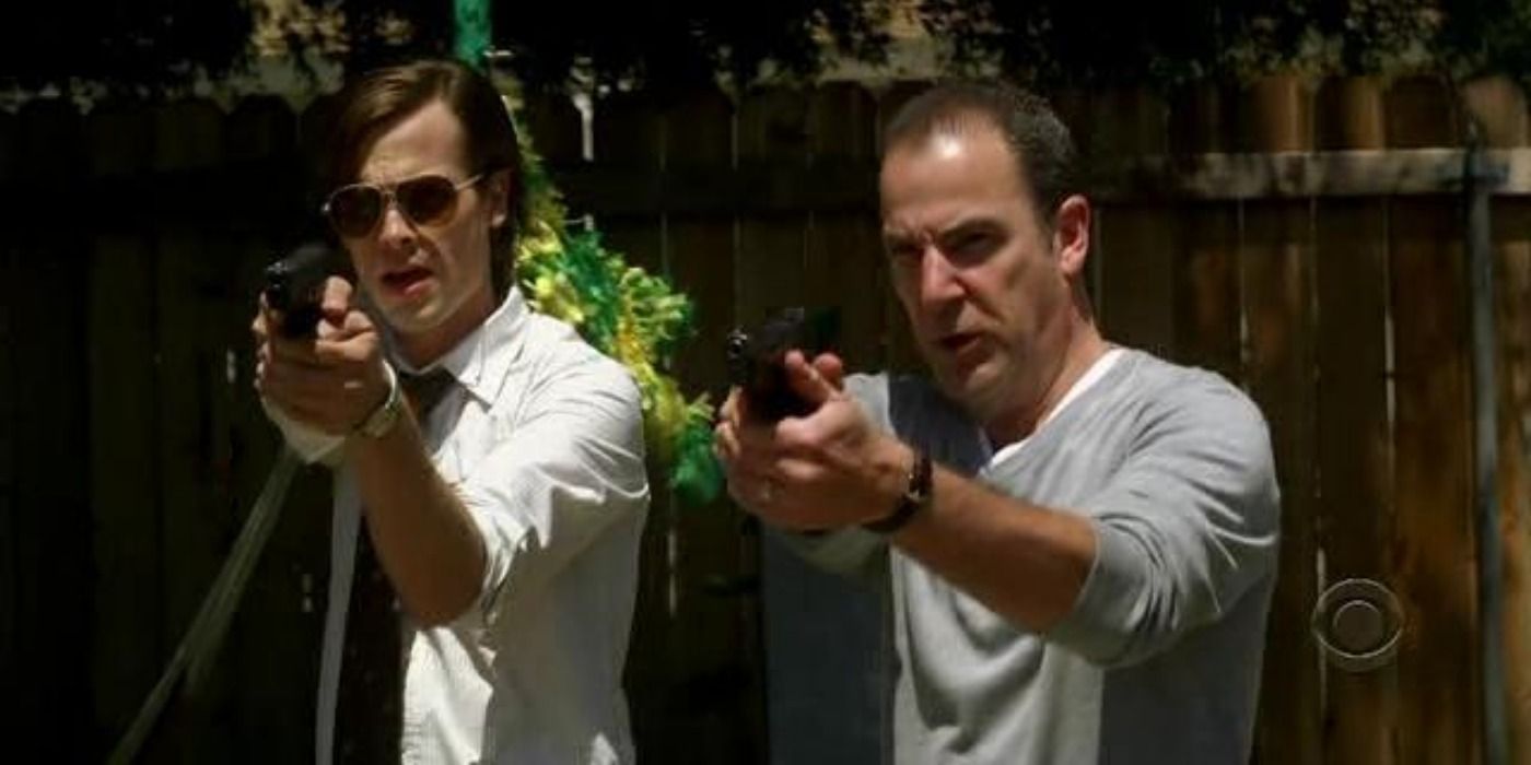Reid and Gideon aiming guns in Somebody's Watching.