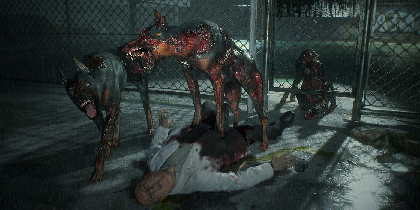 A pack of zombified dogs stands over a dead corpse in Resident Evil 2