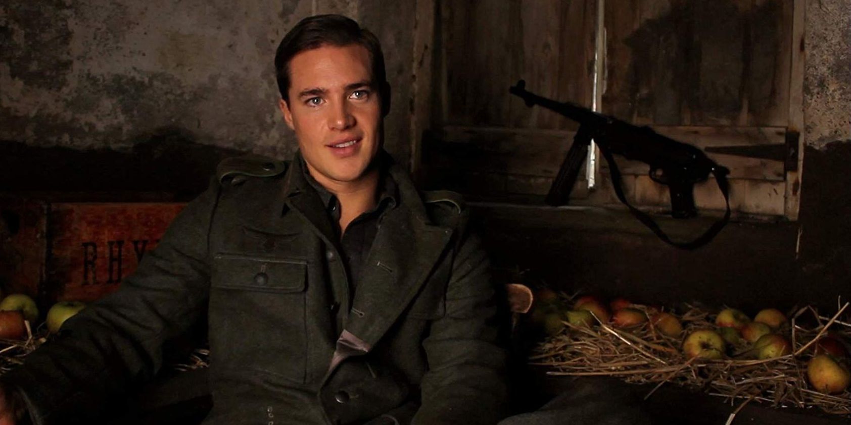 An image of Alexander Dreymon's character hiding out in a barn in Resistance