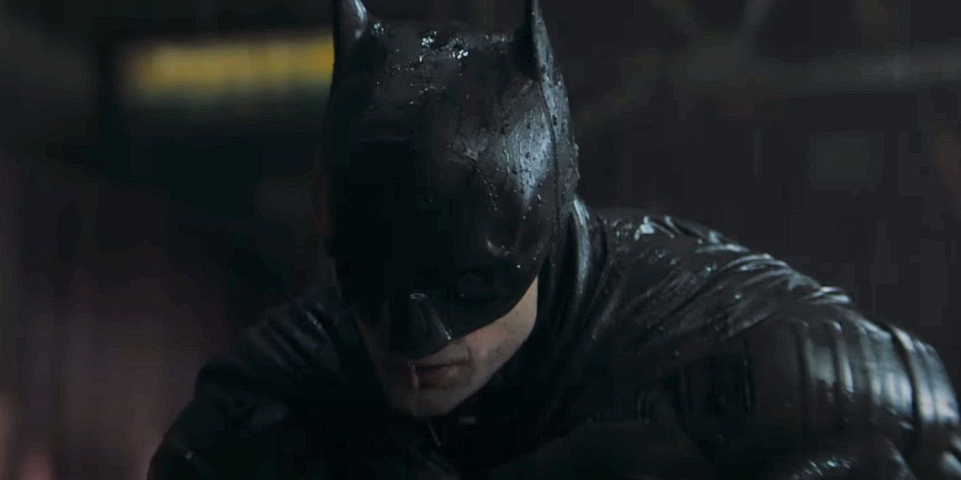 Robert Pattinson as The Batman on the streets of Gotham