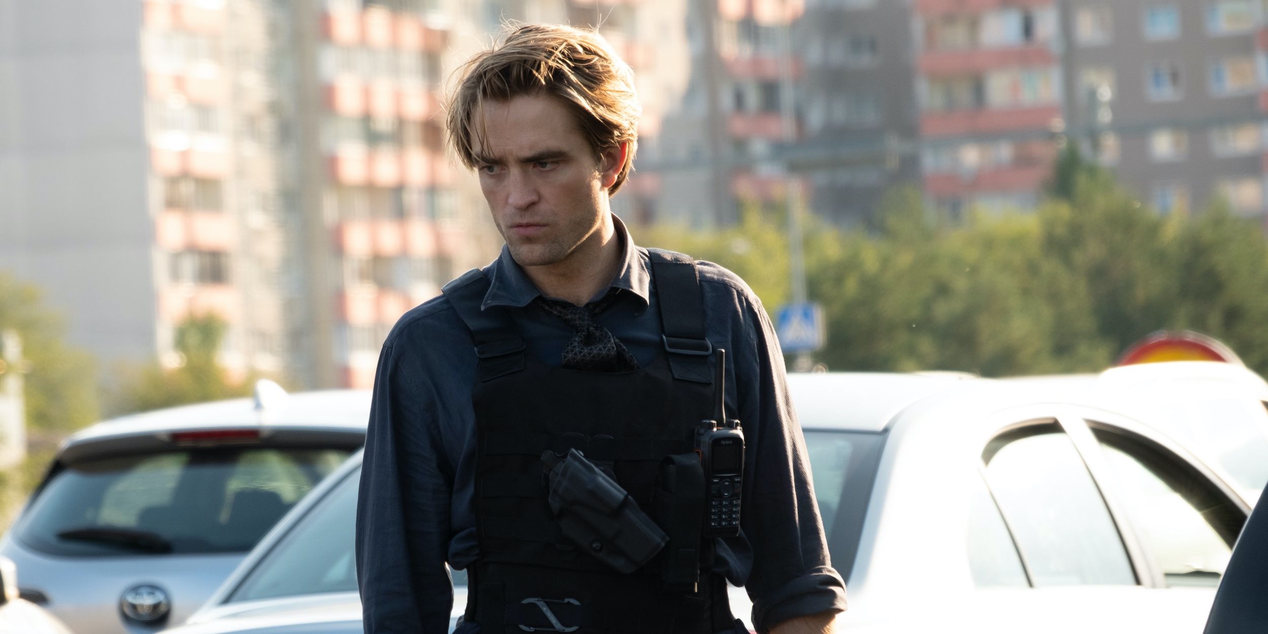Robert Pattinson in a police vest in Tenet