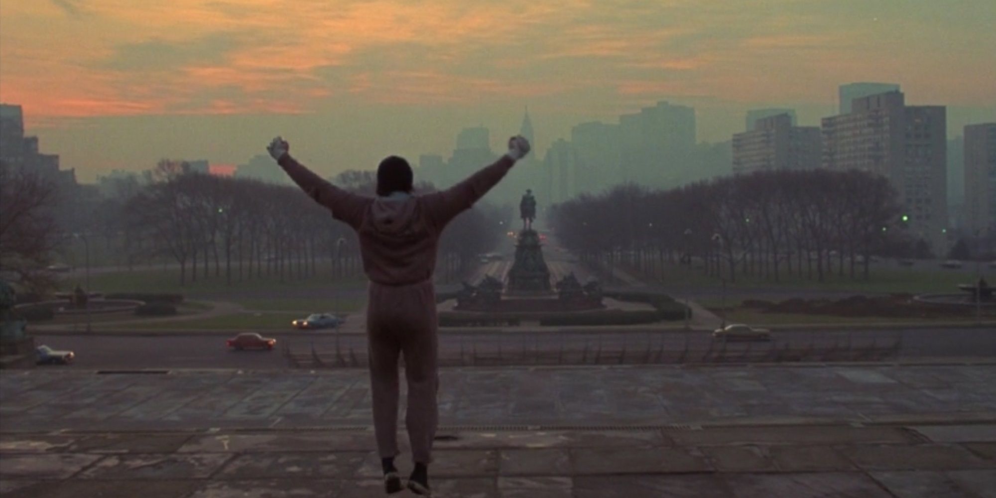 Rocky Balboa standing at the top of the museum steps