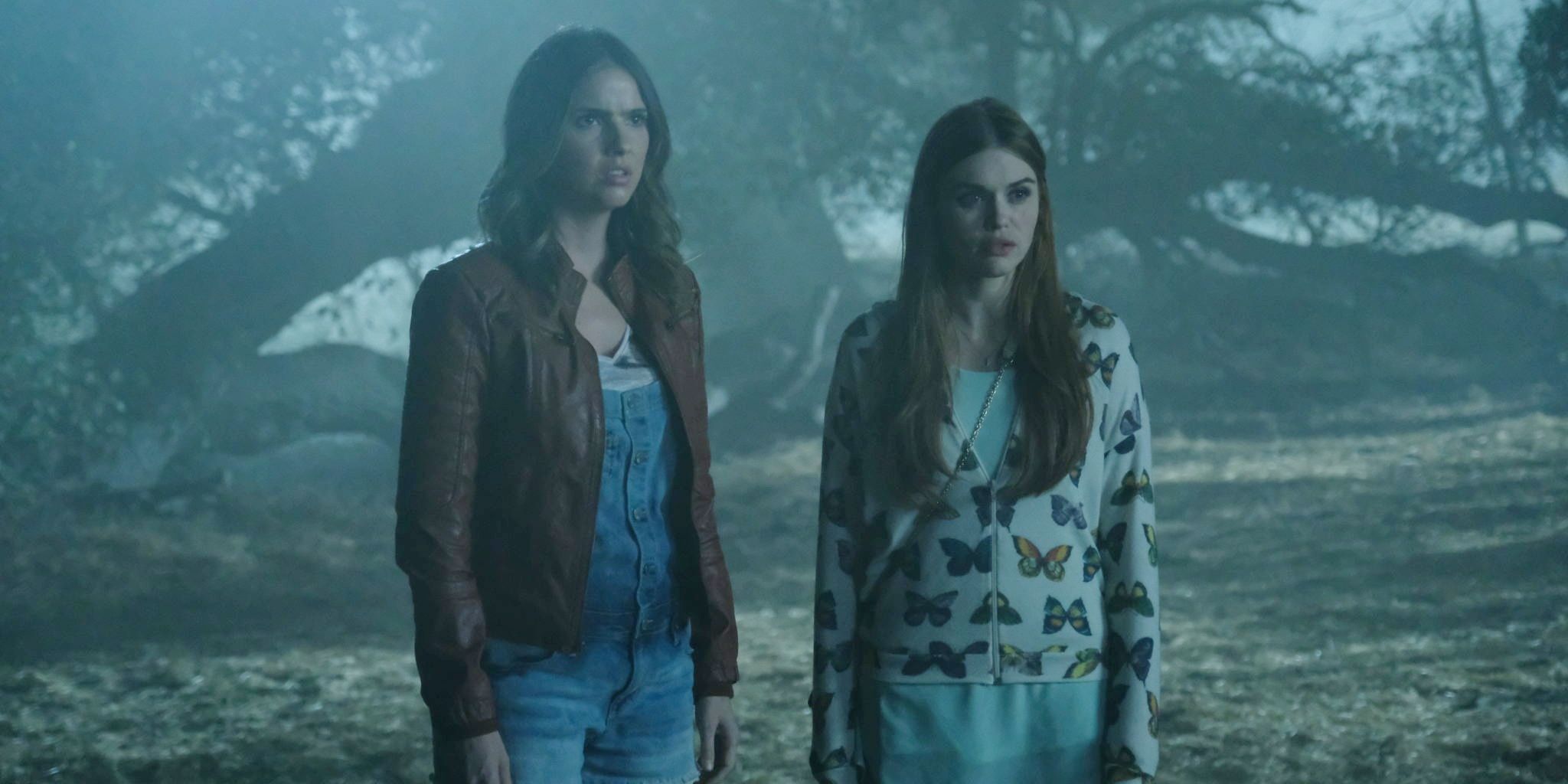 Malia and Lydia in the woods in Teen Wolf.