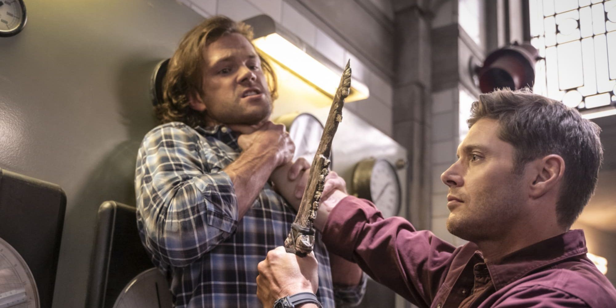 Demon Dean holds Sam by the throat in Supernatural
