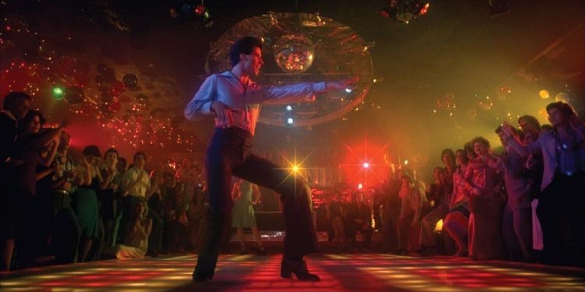 Tony dancing in a disco in Saturday Night Fever.