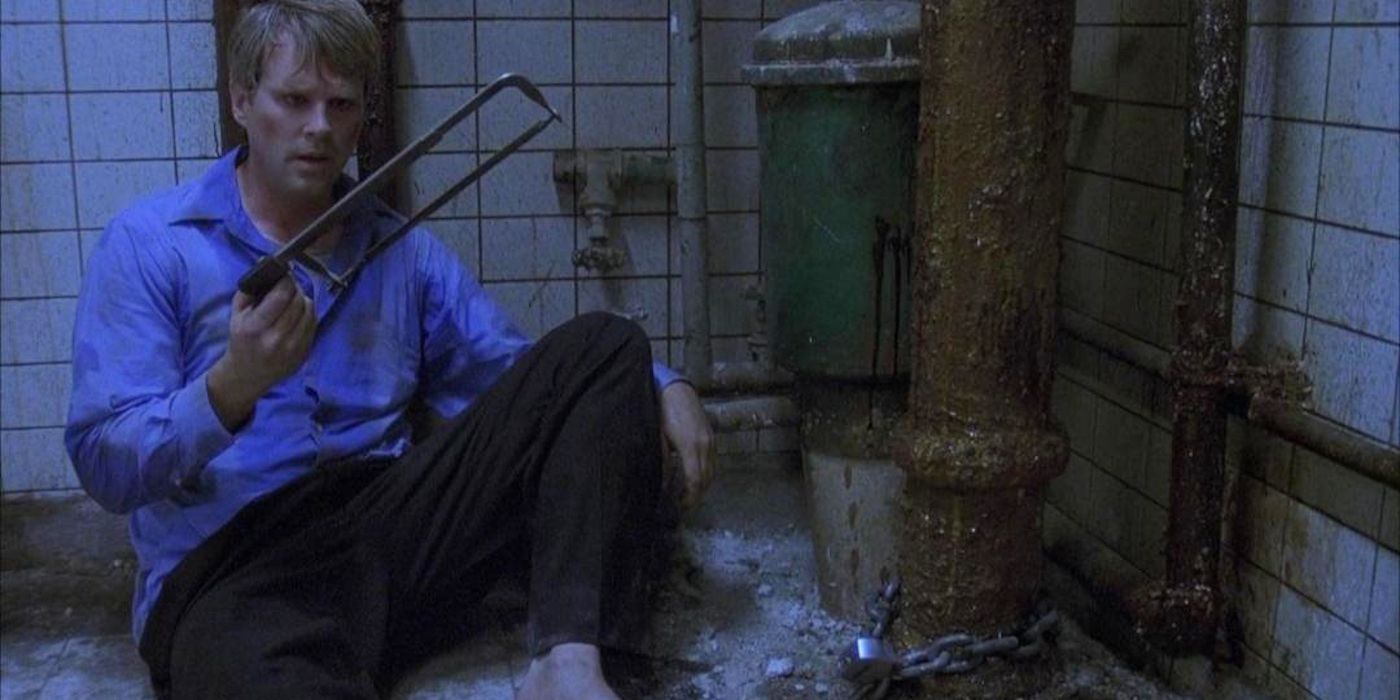 Dr Lawrence Gordon saws off his foot in Saw