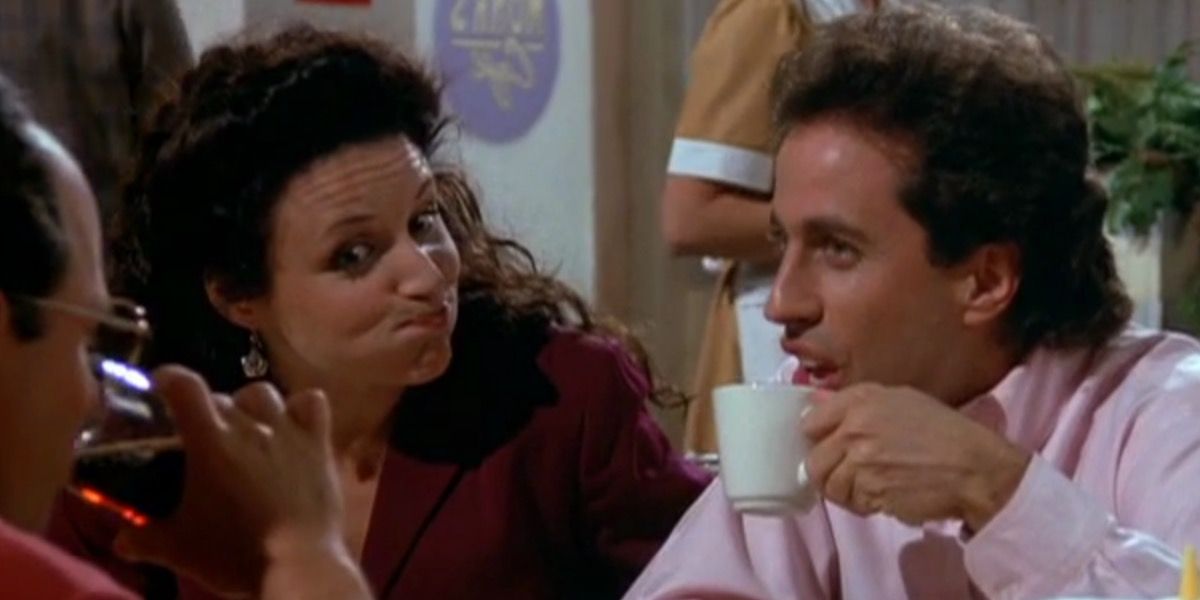Elaine laughs while Jerry looks shocked in Seinfeld