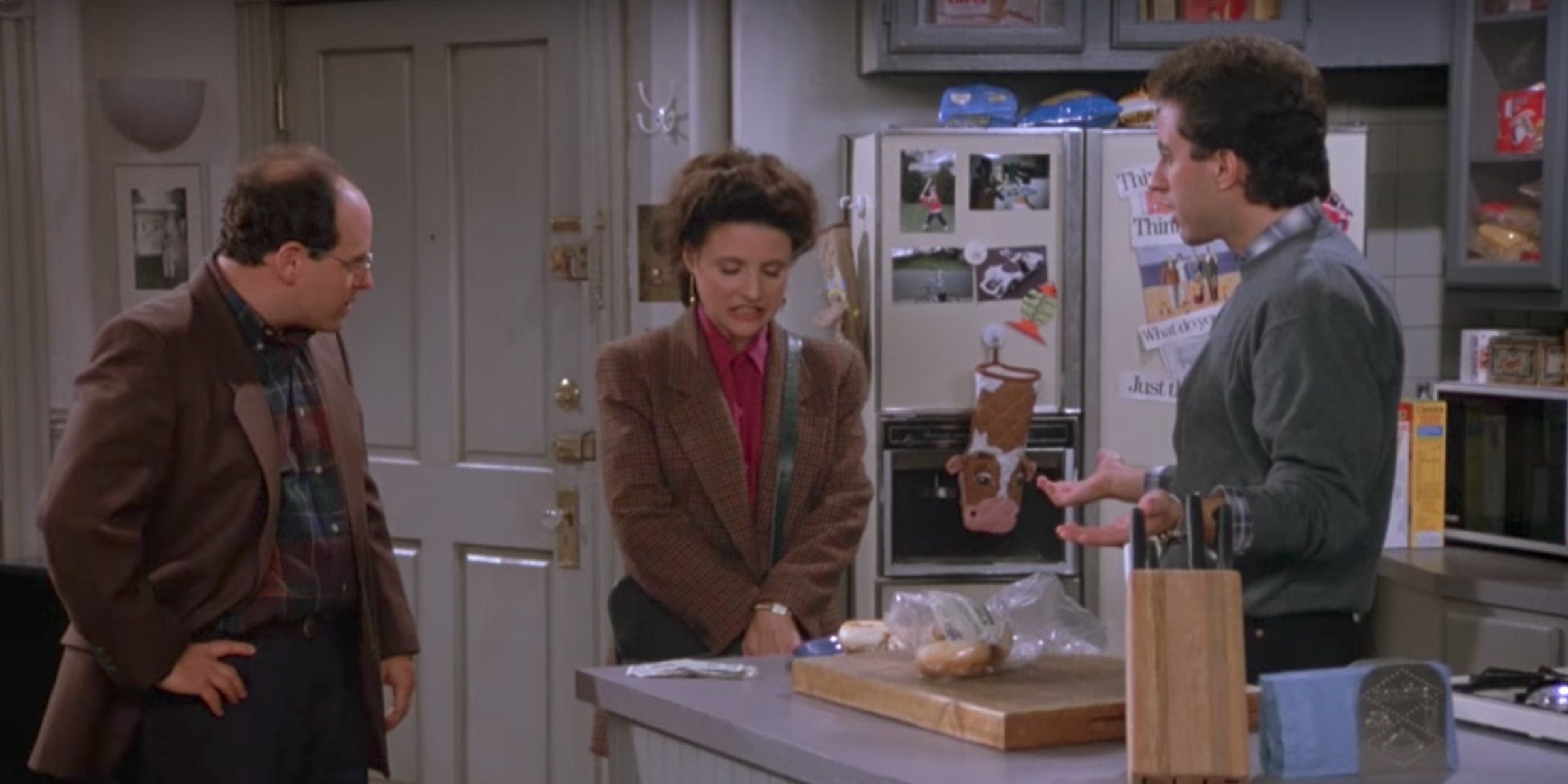 George, Elaine, and Jerry in Jerry's apartment in Seinfeld