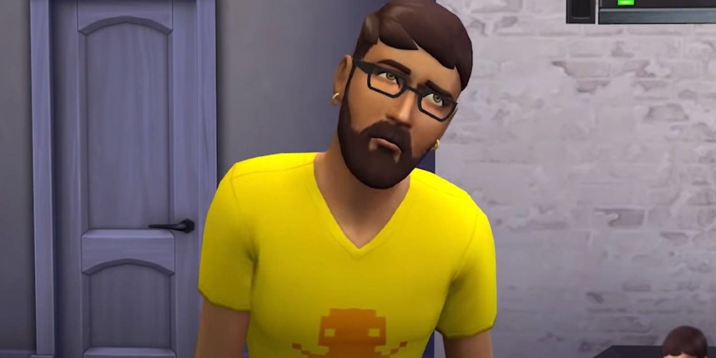 A male sim looking worried in The Sims