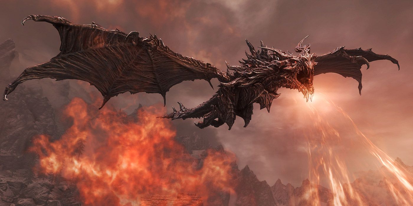 The dreaded Alduin breathing fire during an attack in Skyrim
