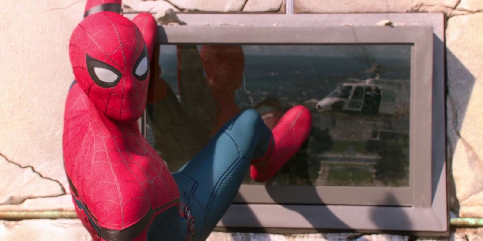 Spider-Man hangs out of window at the Washington Monument