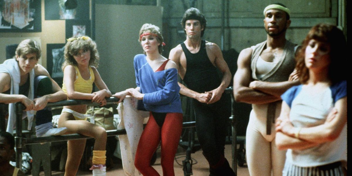 John Travolta leads a cast of dancers in Staying Alive