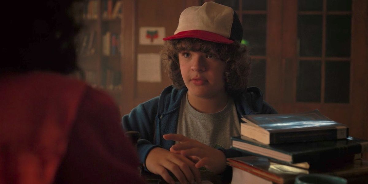 Dustin from Stranger Things talks to the librarian