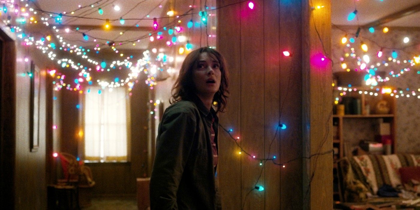 Joyce puts Christmas lights in her house to communicate with Will