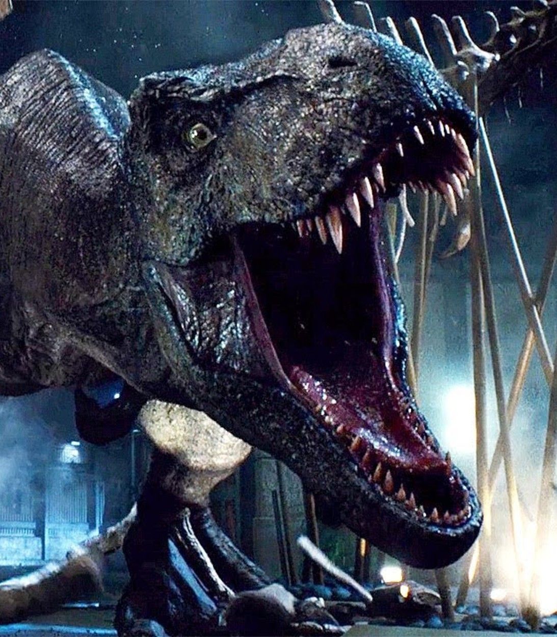 T-Rex smashes through Spinosaurus skeleton in Jurassic World pic vertical
