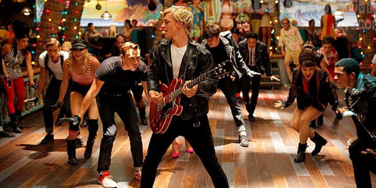 The cast of Teen Beach Movie dancing a rock n roll number