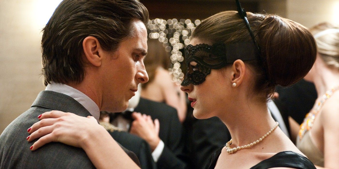 Bruce and Selina dance together at a ball in The Dark Knight Rises