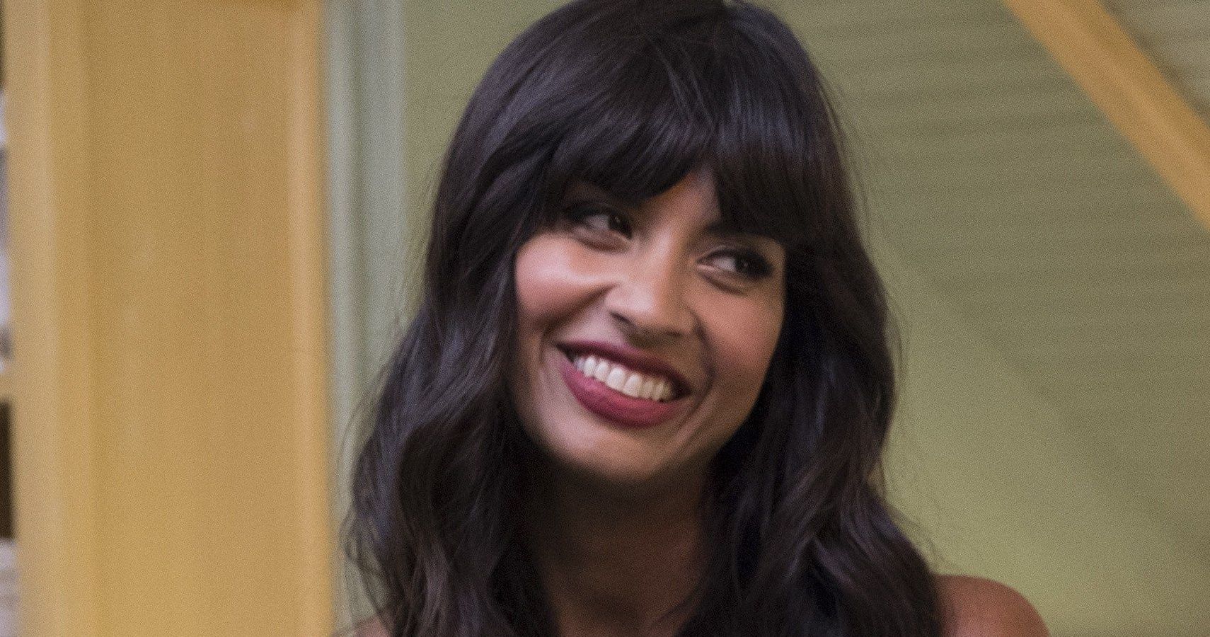 Tahani from The Good Place smiling