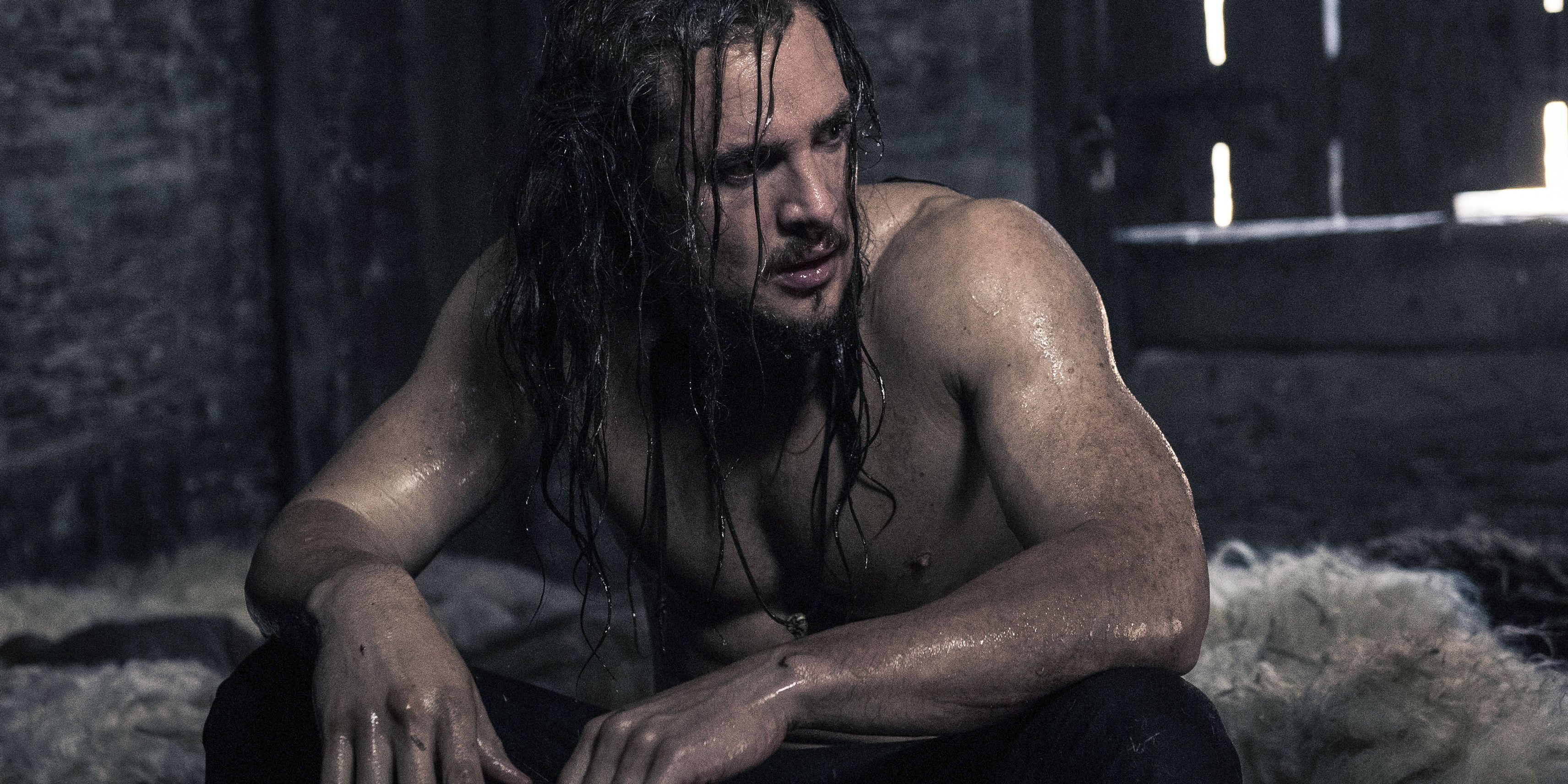 An image of Uhtred having a wash in The Last Kingdom