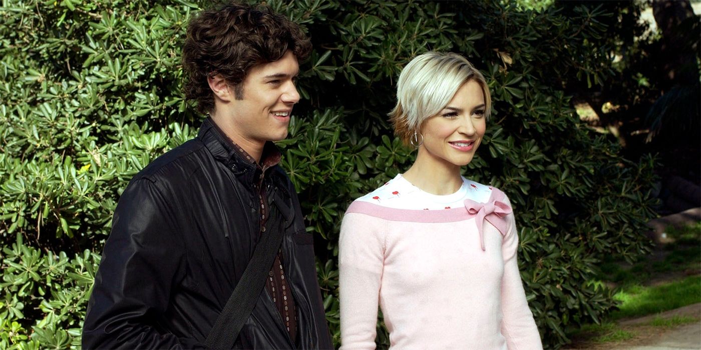 Seth and Anna standing outside and smiling on The O.C.