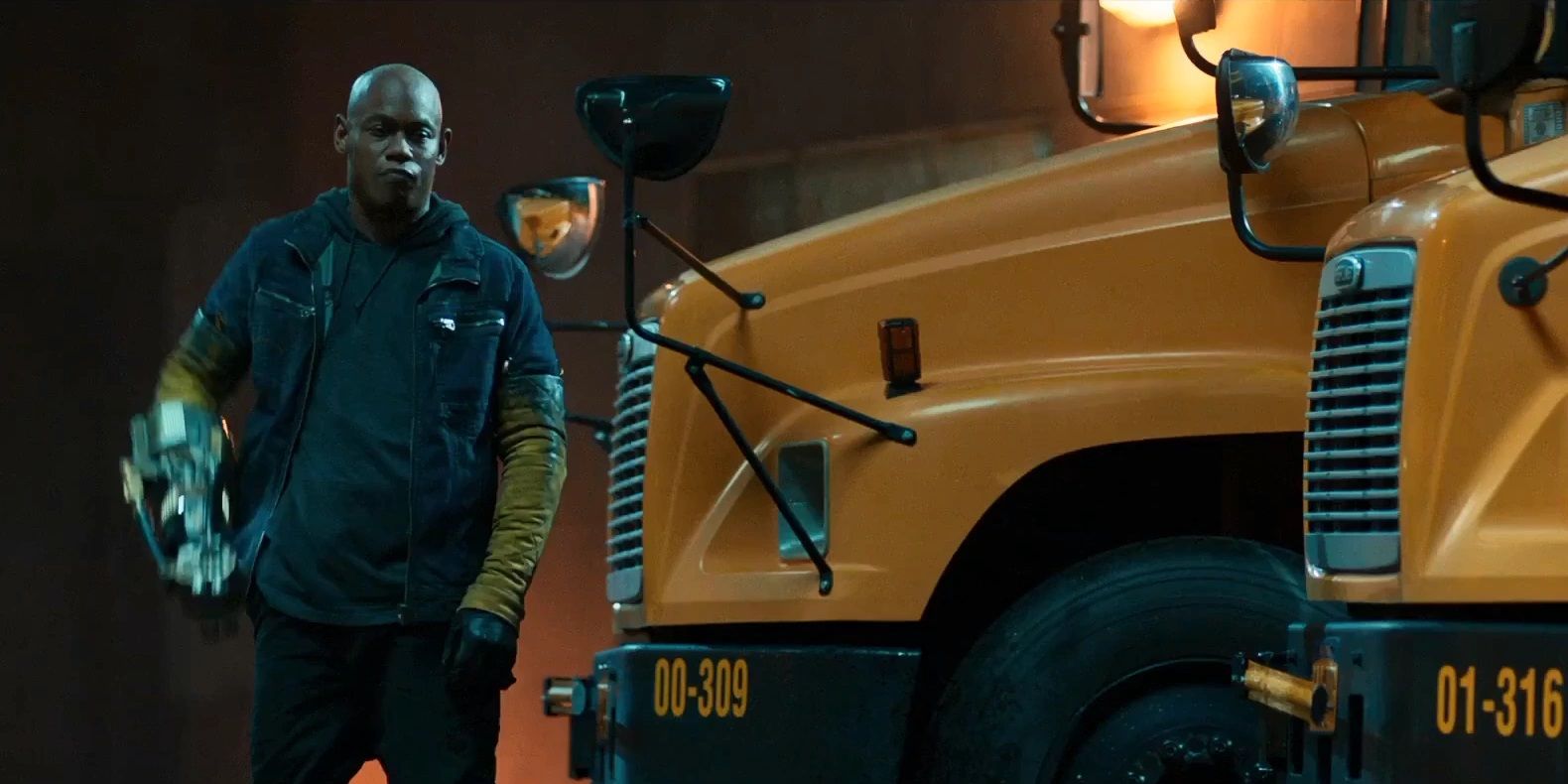 The Shocker by a school bus in Spider-Man Homecoming