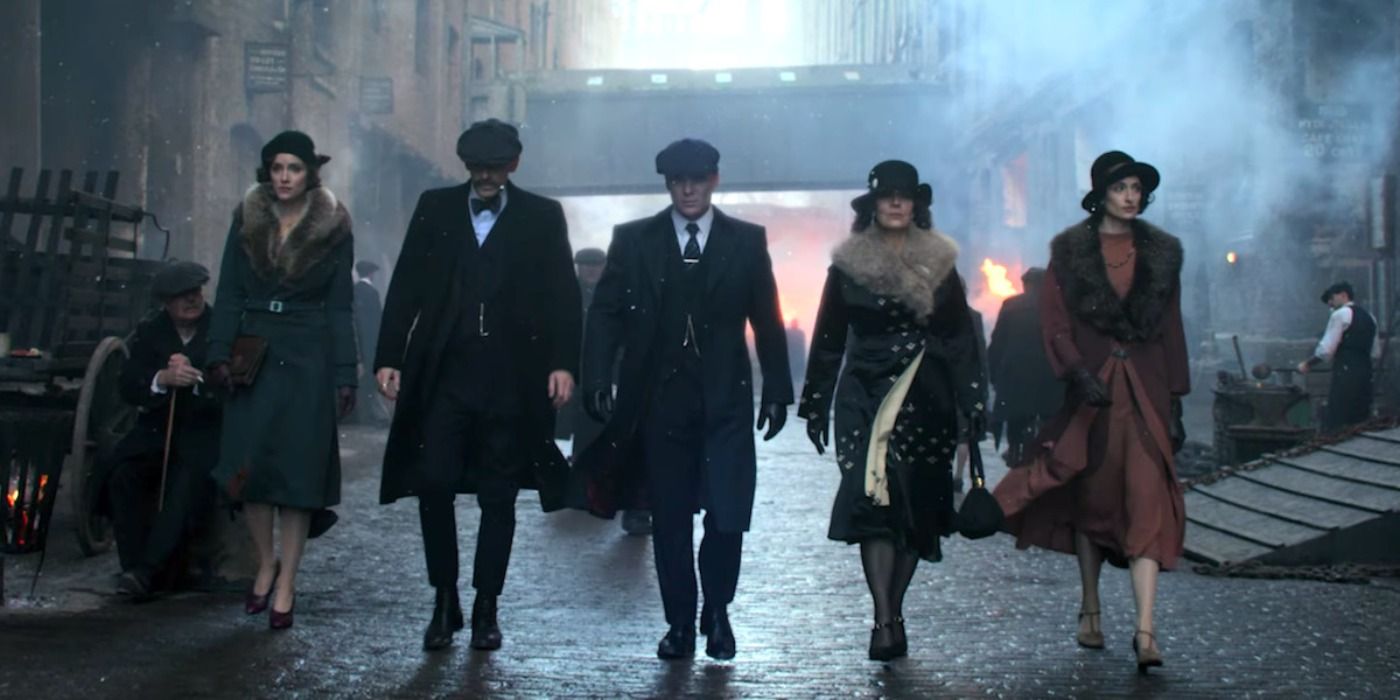 Tommy, Polly, Lizzie, Ada, and Arthur walk through Small Heath in Peaky Blindes