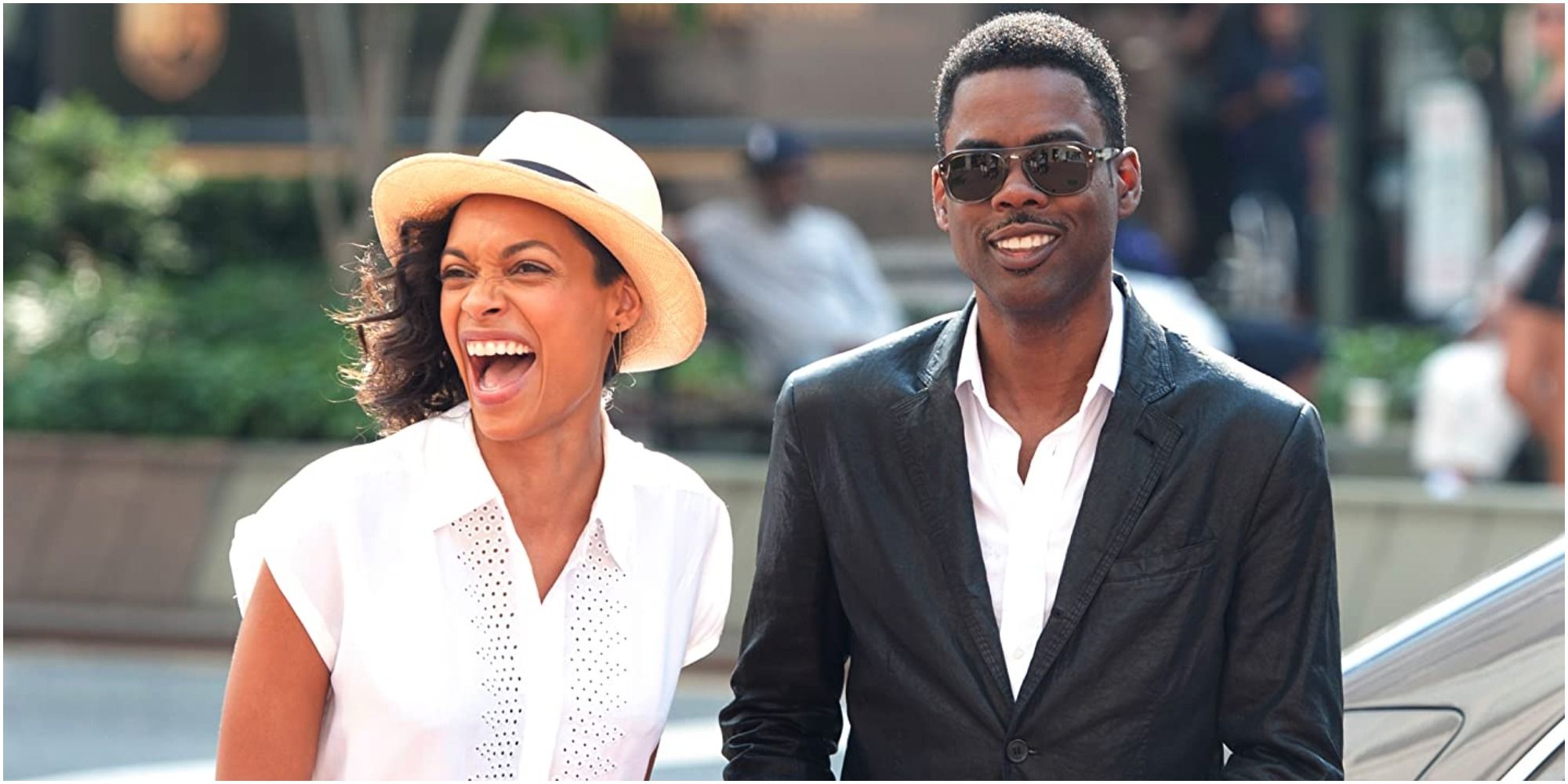 Chris Rock and Rosario Dawson laughing in Top Five