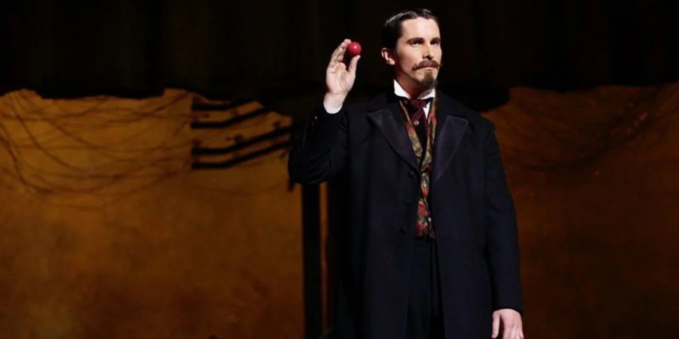 Christian Bale demonstrating a ball on a stage in The Prestige