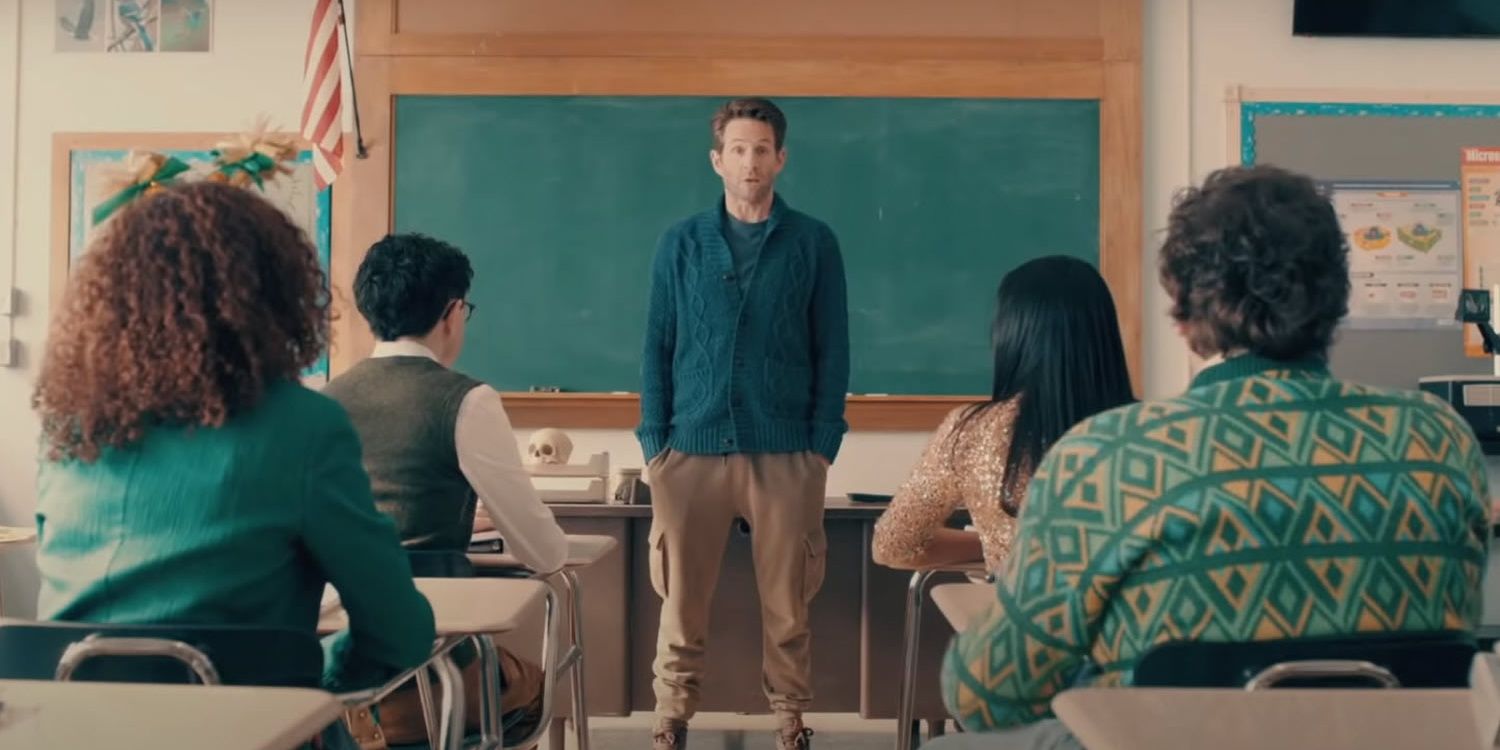 Glenn Howerton standing in front of a class of kids in AP Bio