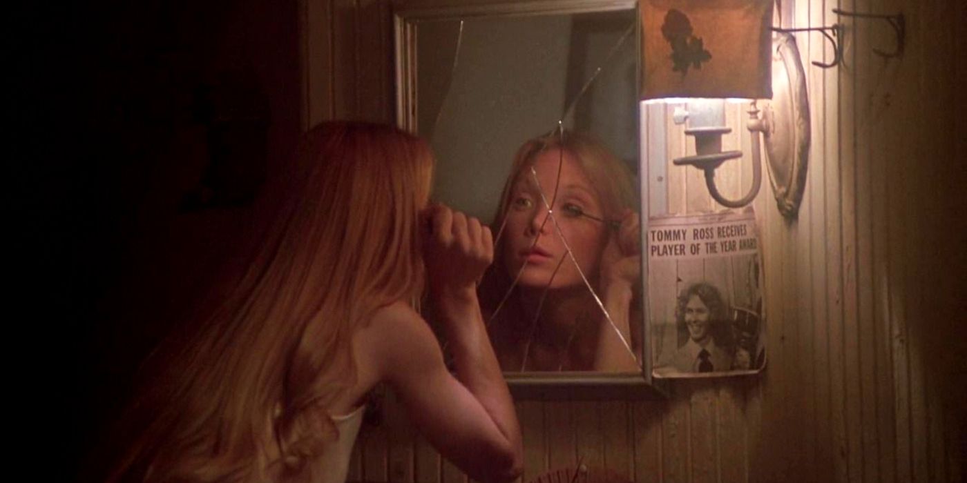 Carrie looking in the mirror