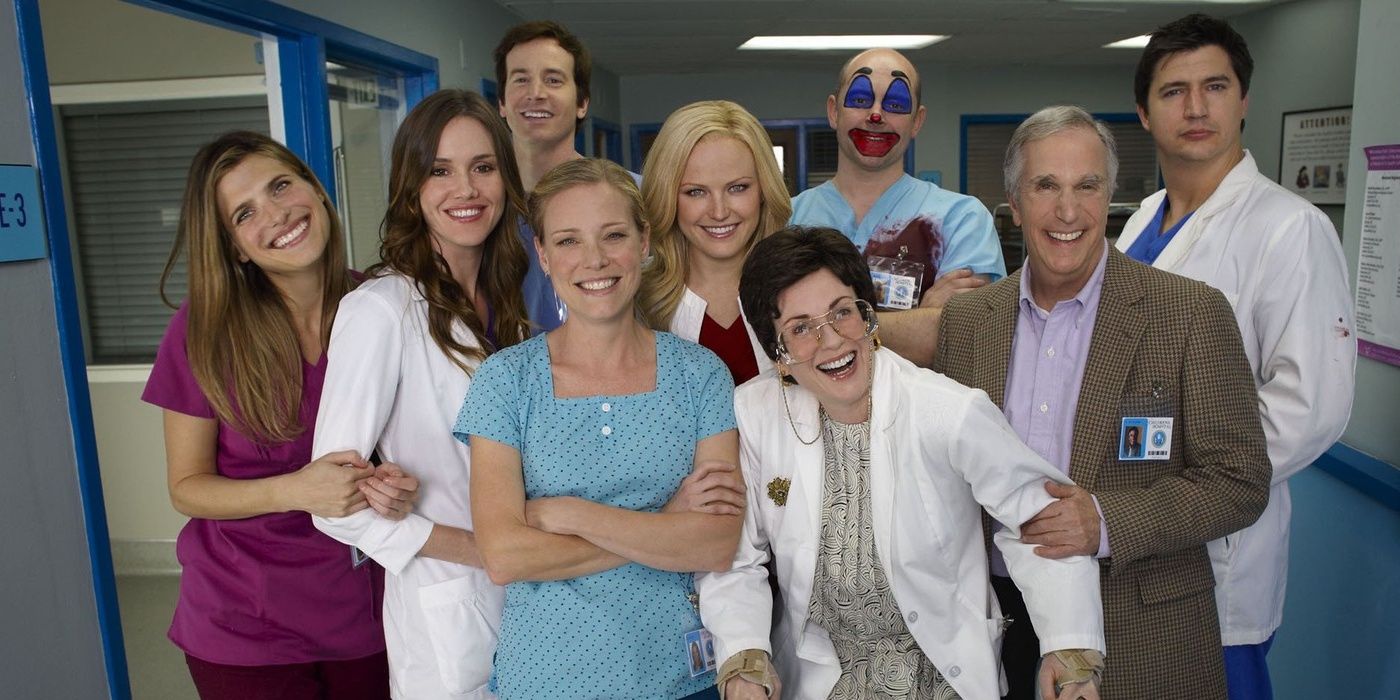 The cast of Children's Hospital pose in front of the camera.