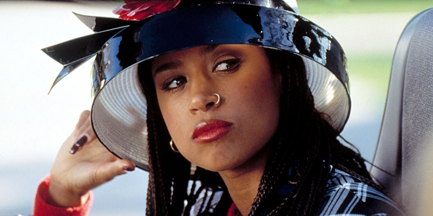 Dionne looking serious wearing a hat in Clueless
