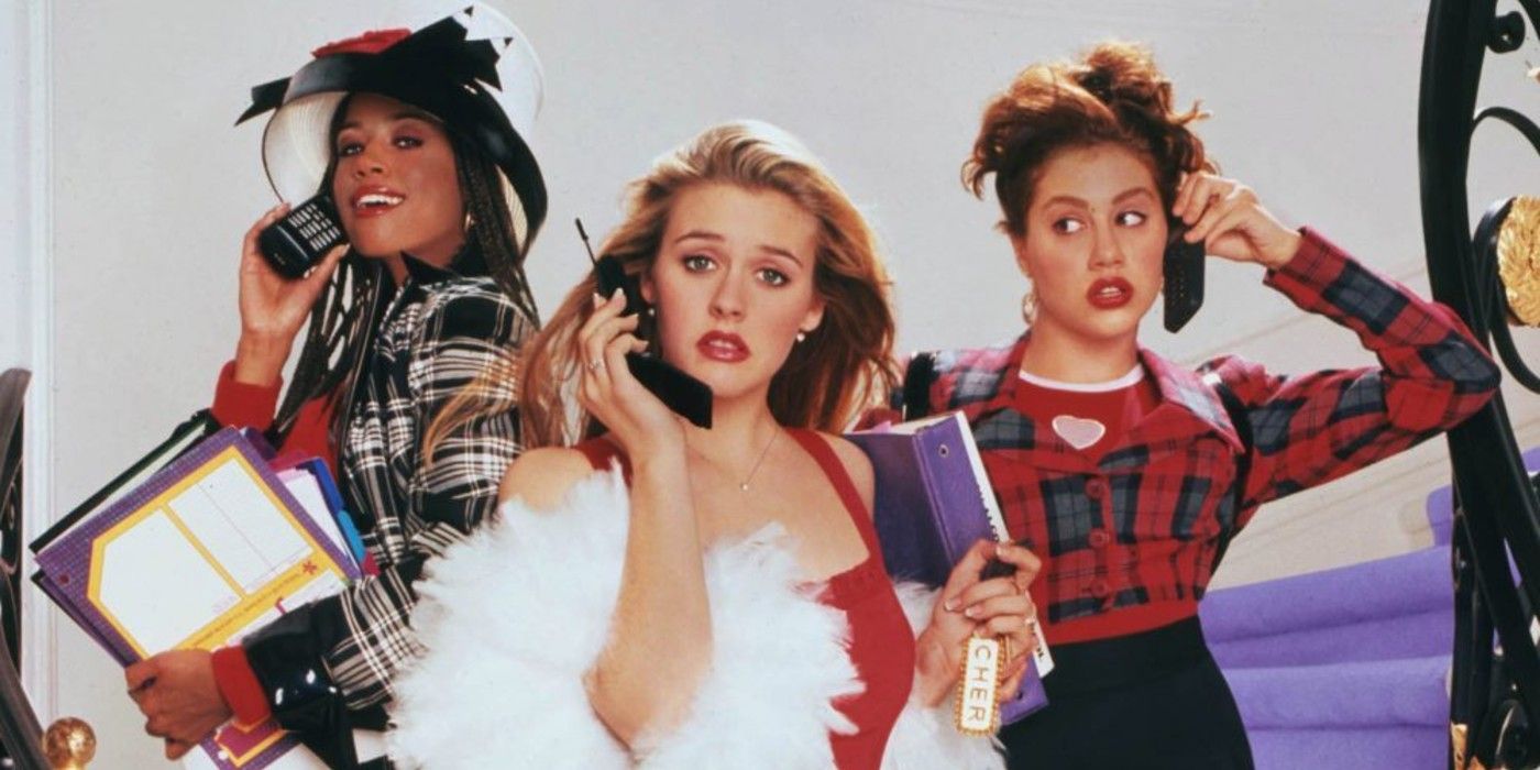 Dionne, Cher, and Tai on the phone on the postewr for Clueless