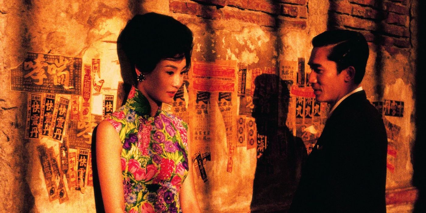 A man and woman stand in an alley in In The Mood For Love