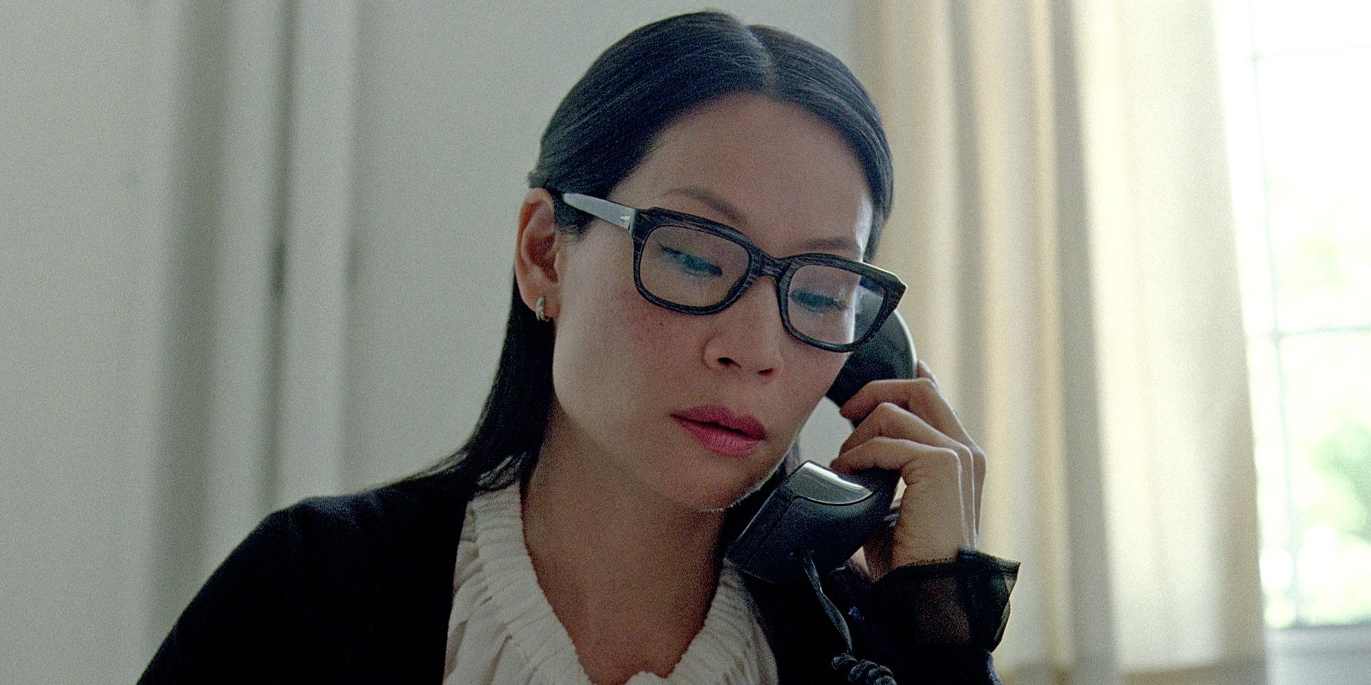 Lucy Liu on the phone in Detachment.