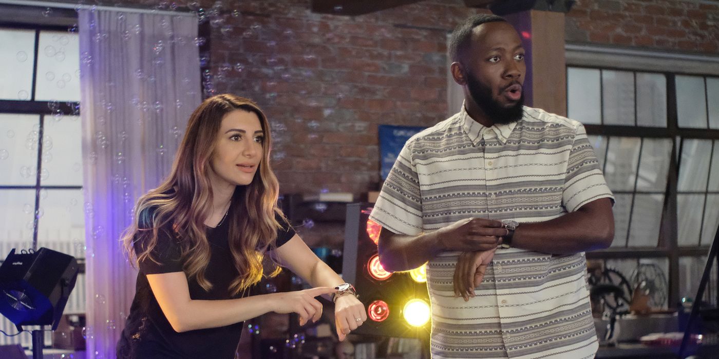 Aly and Winston play games in the loft in New Girl
