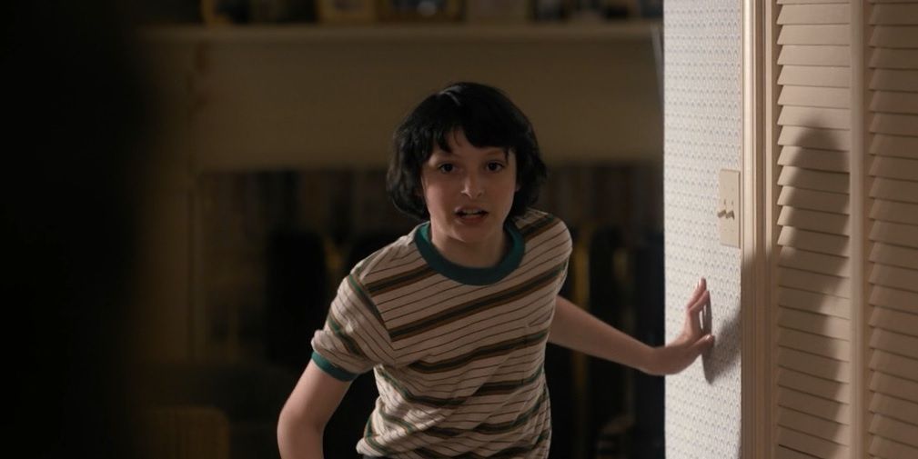Mike from Stranger Things Yells while preparing to run down to the basement