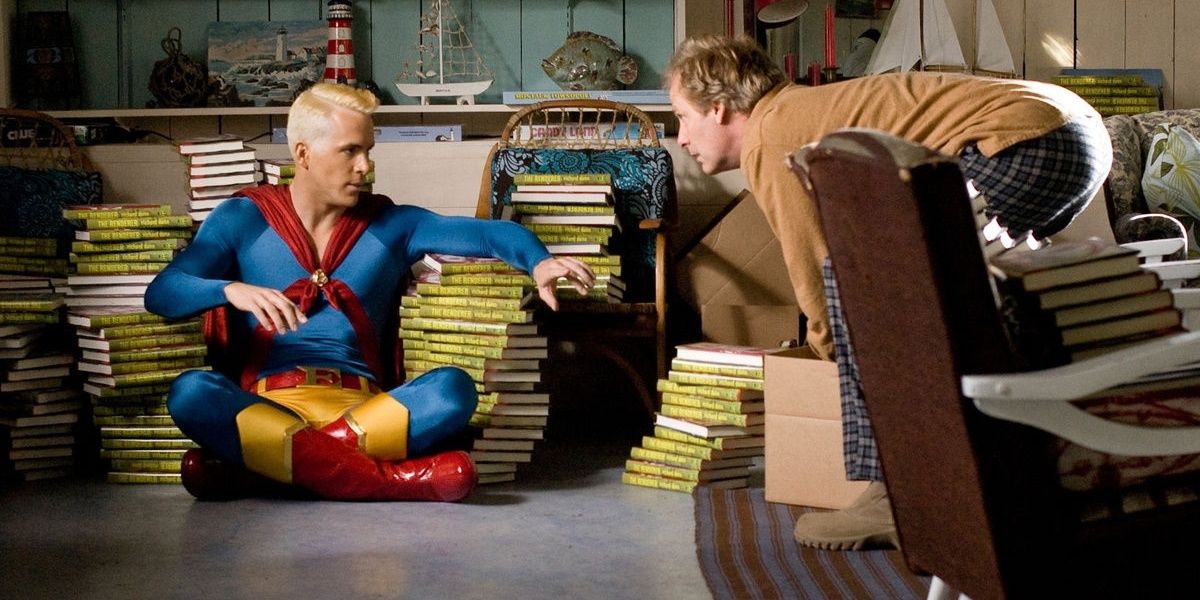 Ryan Reynolds sits on a couch as Paper Man