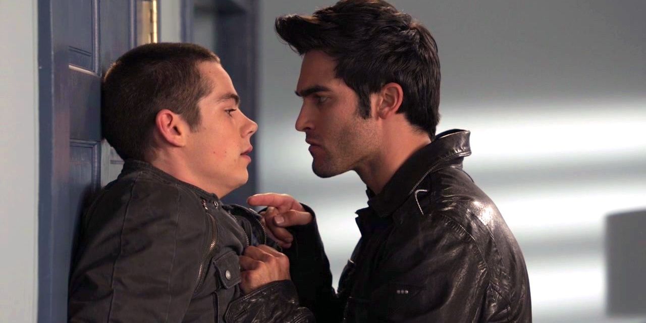 Derek pushes Stiles against a locker in Teen Wolf.