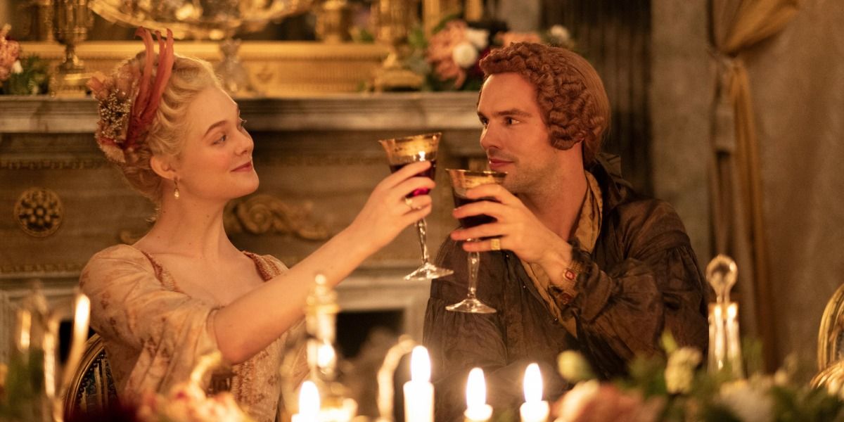 Catherine and Peter III toasting at dinner in The Great