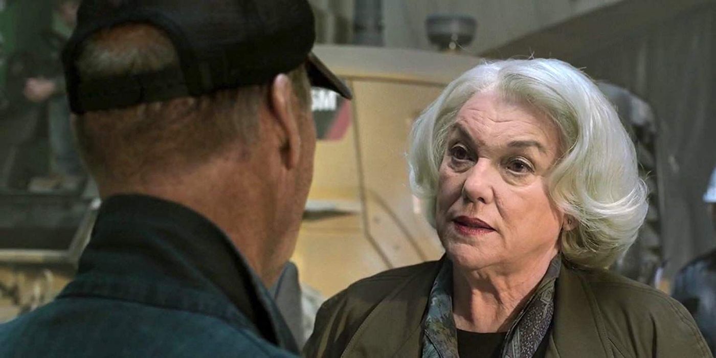 Agent Anne-Marie Hoag (Tyne Daly) lectures Adrian Toomes (Michael Keaton) in the flashback sequence of Spider-Man: Homecoming