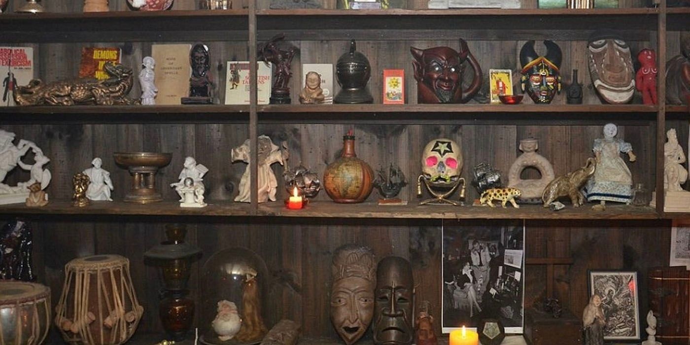 Warren's childrens tombstones on a shelf in the occult museum