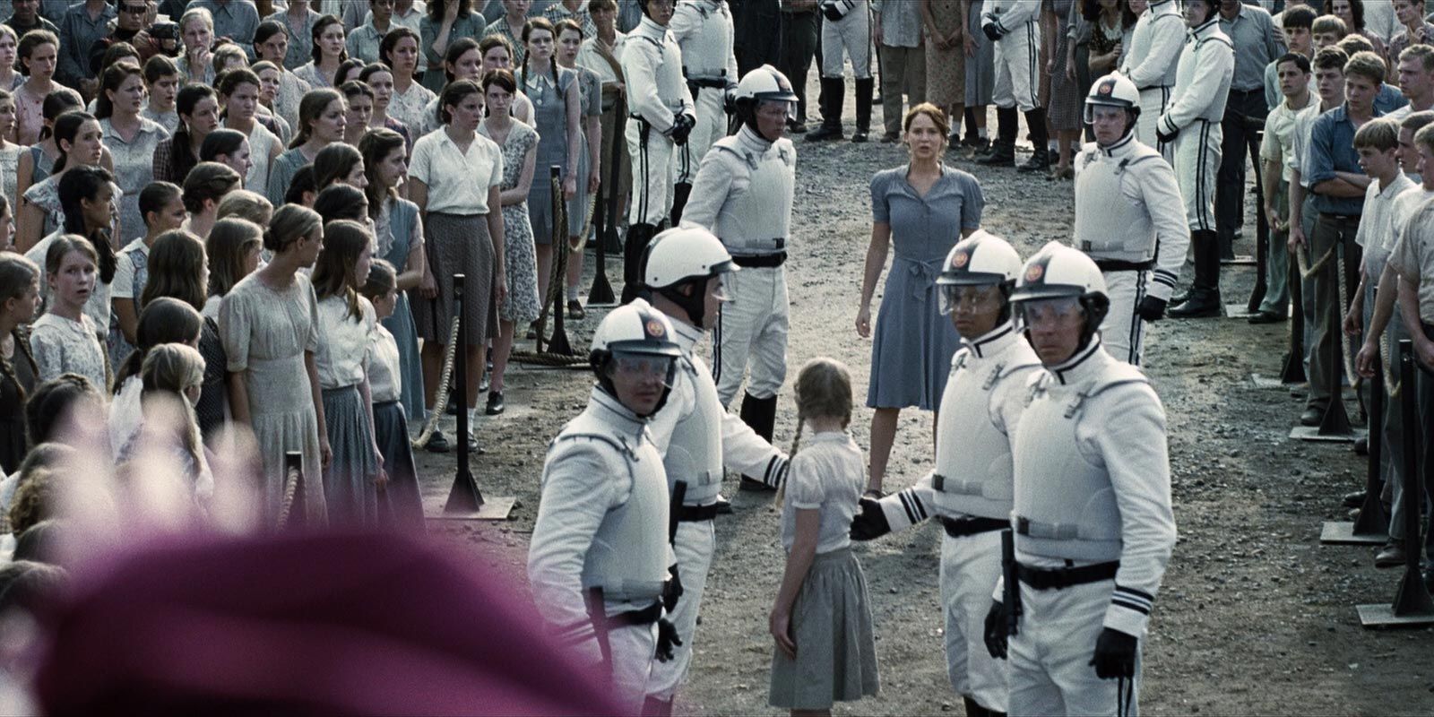 An image of Katniss volunteering in The Hunger Games