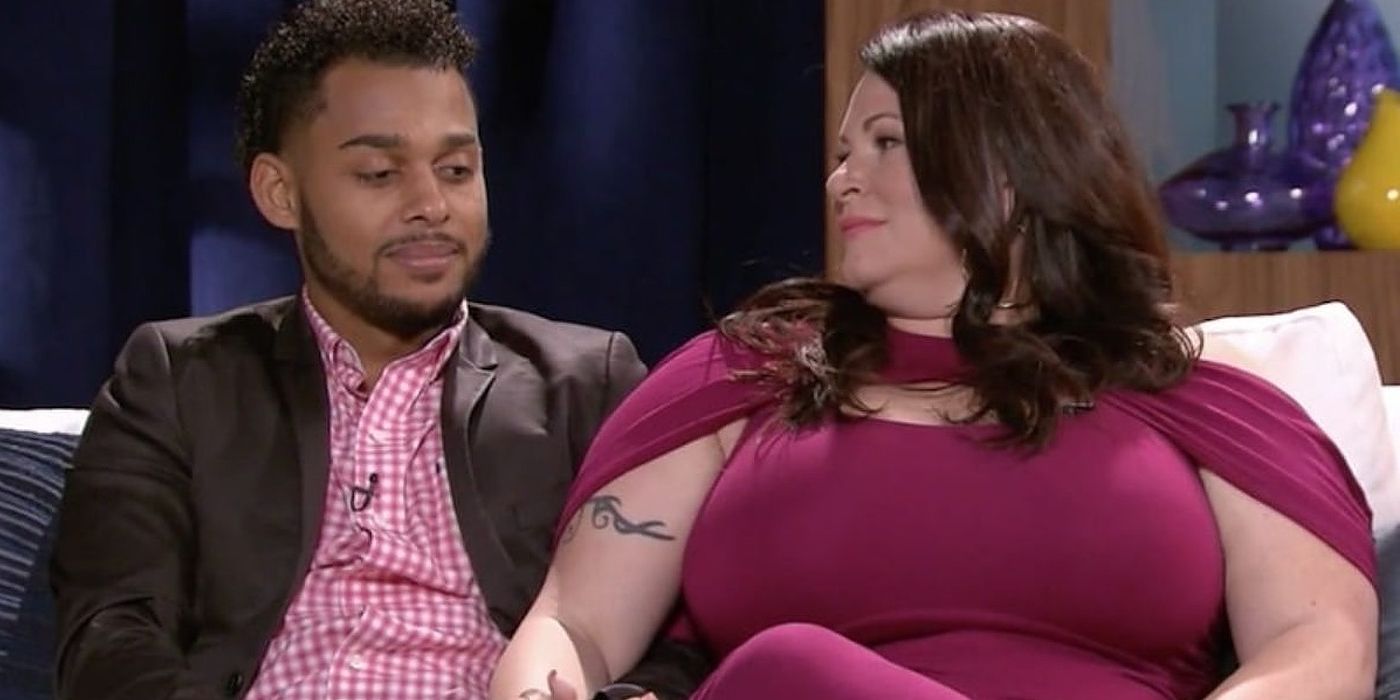 90 Day Fiance Molly Hopkins in burgundy dress and Luis Mendez in pink shirt