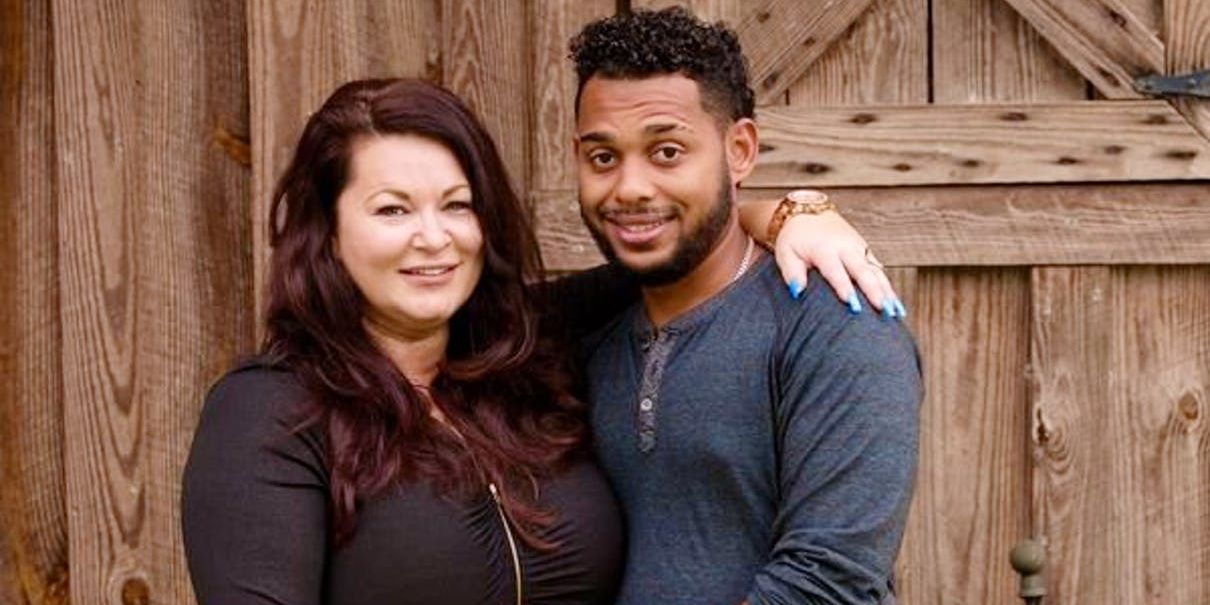 Molly Hopkins and Luis Mendez posing together and smiling in 90 Day Fiancé.