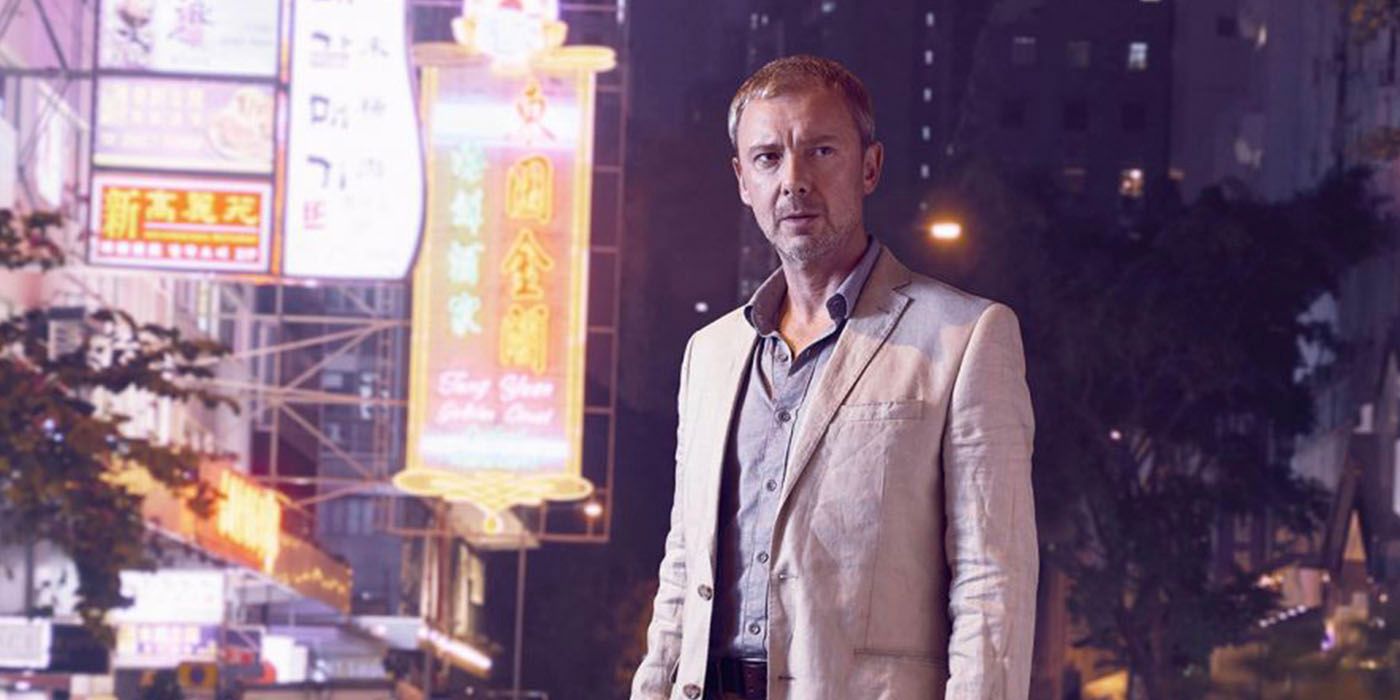 Professor Jonah Mulray (John Simm) outside on the street in Strangers AKA White Dragon