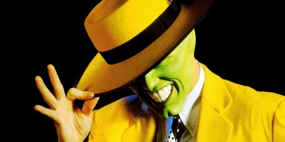 A promotional still of Jim Carrey as The Mask tipping his hat